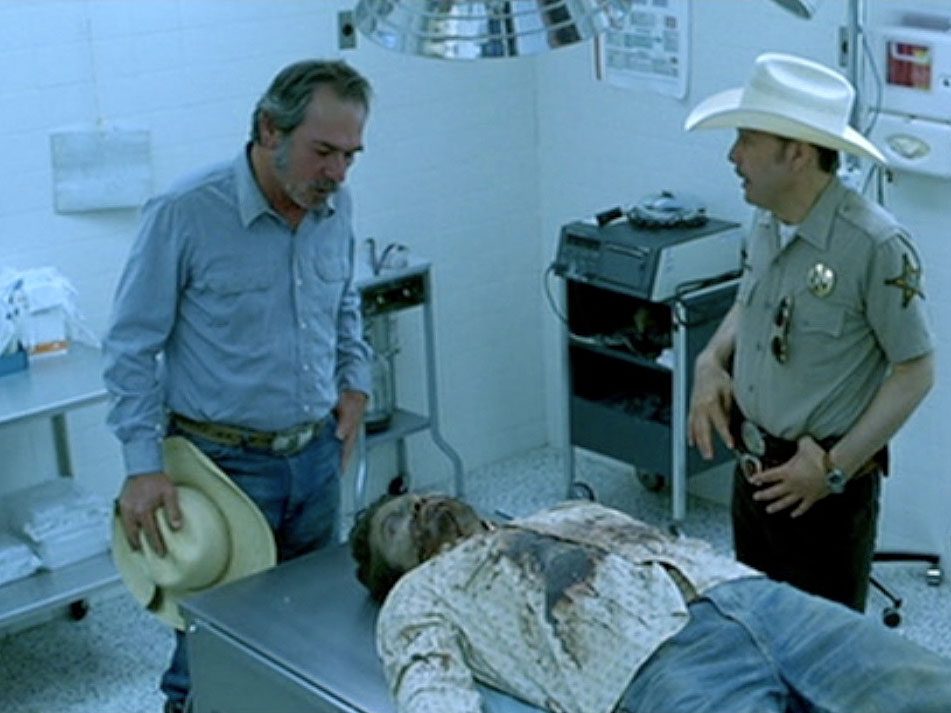 The Three Burials of Melquiades Estrada: Tommy Lee Jones and Dwight Yoakam at morgue