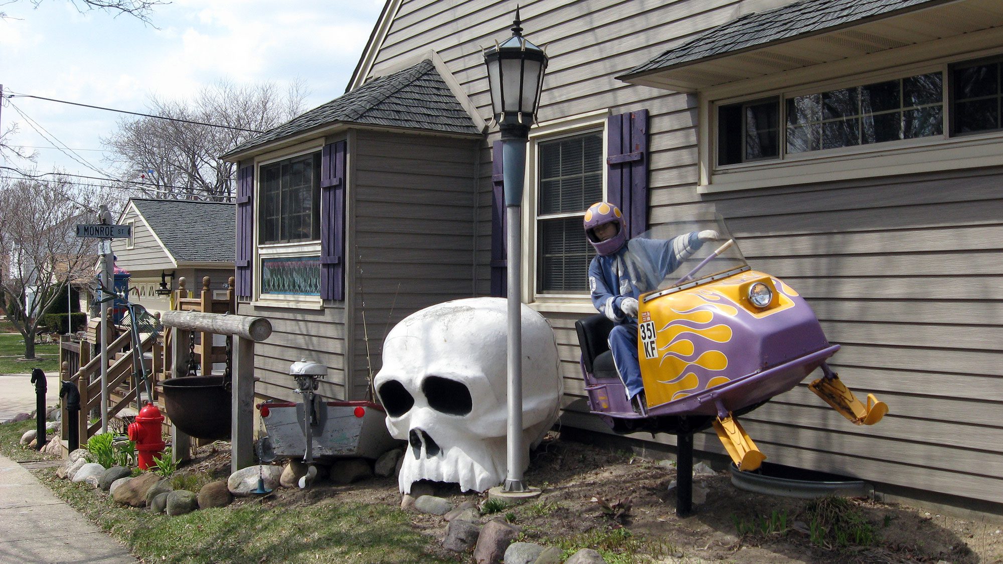 snowmobile, skull in yard, Cudahy WI