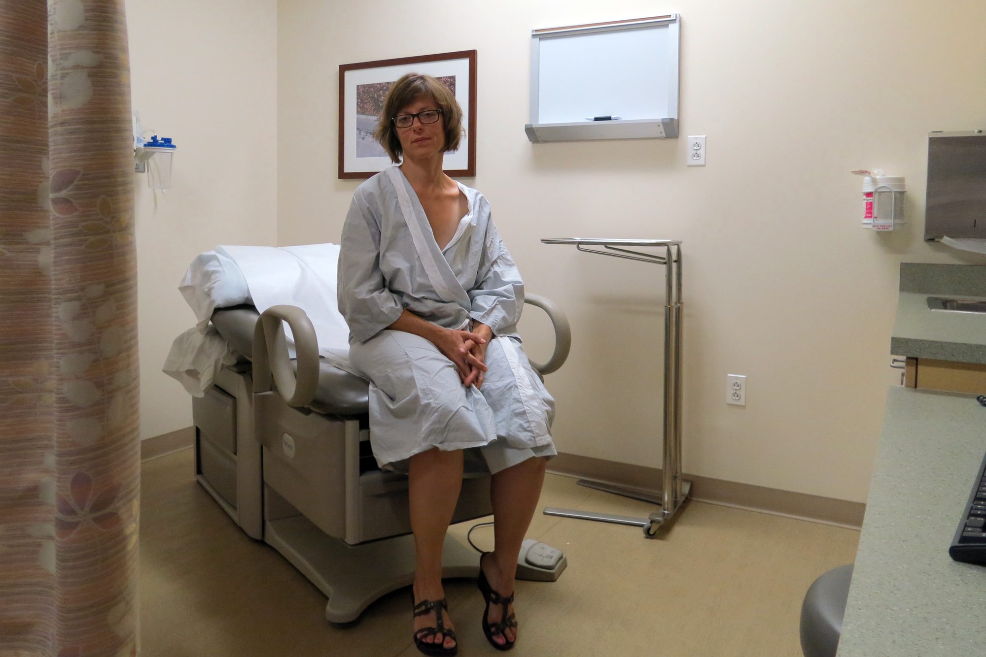 Breast cancer patient Amy Czerniec in an examining room at Froedtert Clinical Cancer Center, Milwaukee, Wisconsin