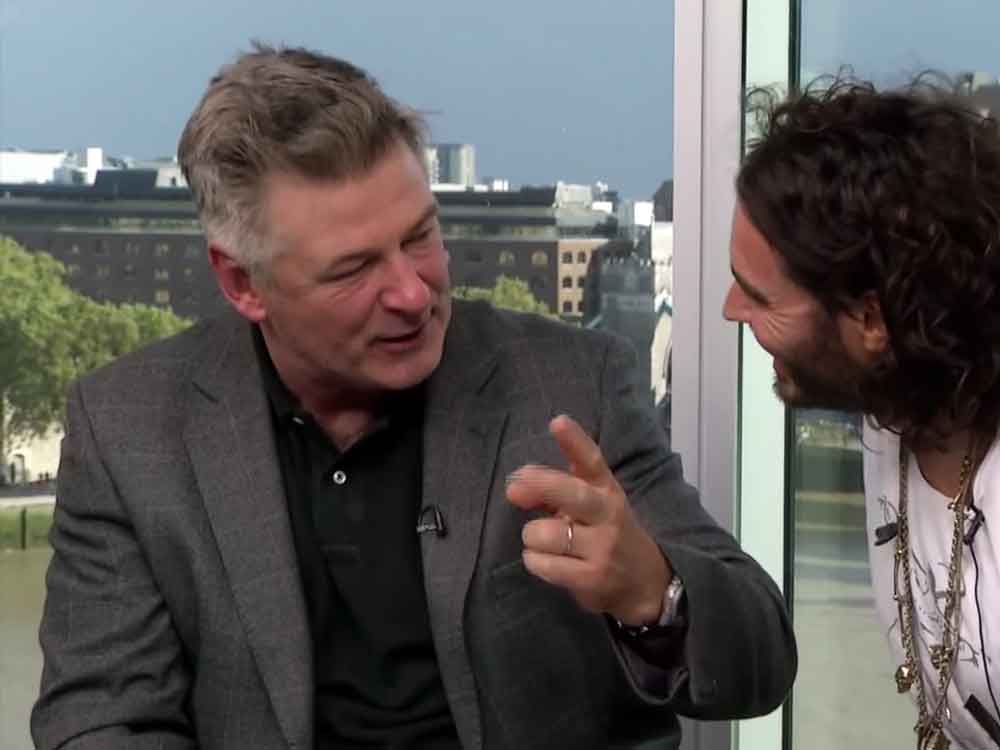 Alec Baldwin guests on Russell Brand's YouTube show The Trews