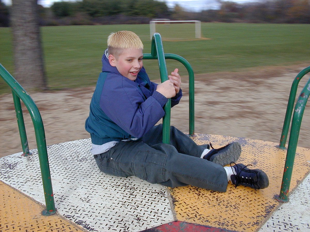 Elliot rides the merry-go-round at Silver Lake Park in Salem, Wisconsin