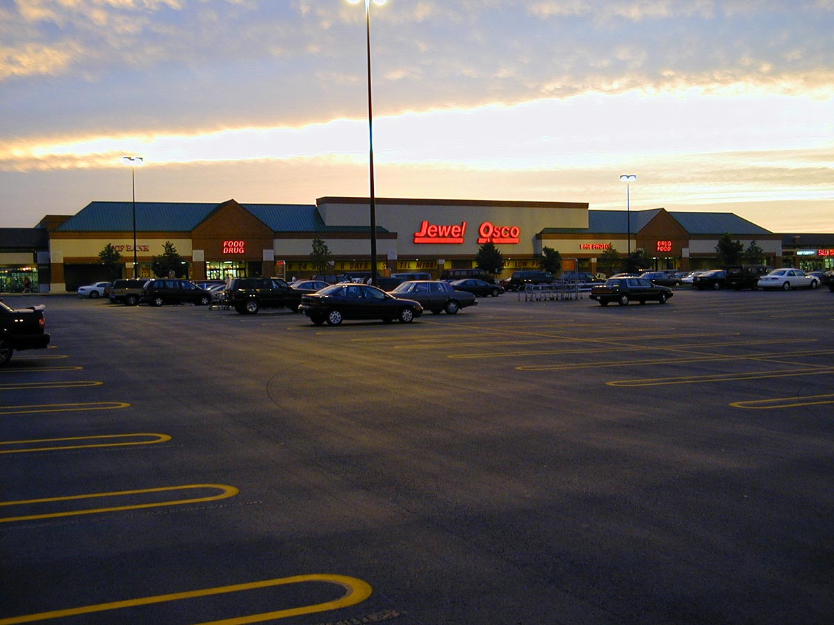 Fresh asphalt surface on parking lot at Southport Plaza in Kenosha, Wisconsin.