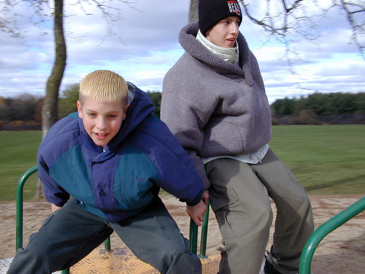 Riding the merry-go-round at Silver Lake Park in Salem, Wisconsin are Elliot and Erik