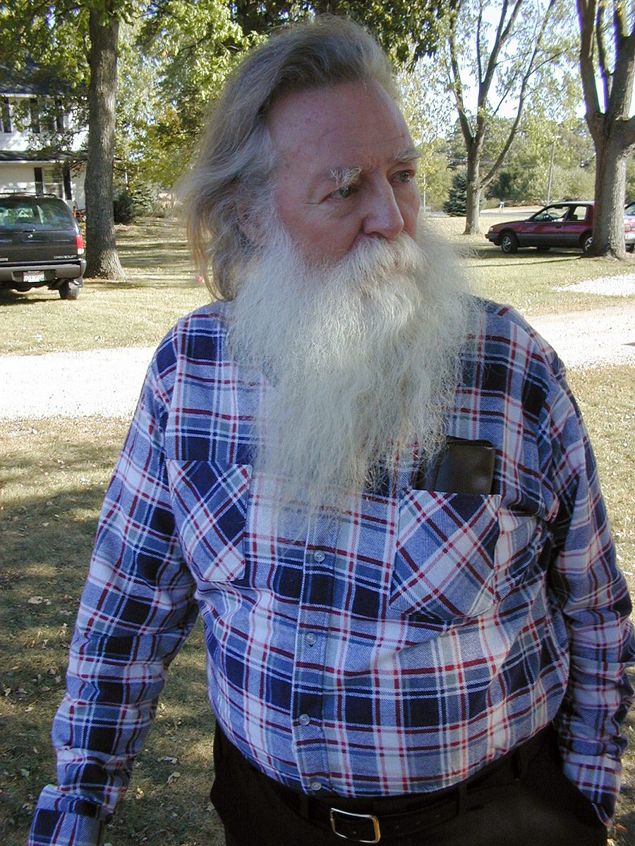 Tom Dibble with beard and plaid shirt