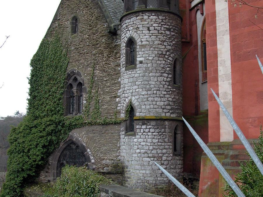 Stone tower and building behind Limburg Cathedral in Limburg an der Lahn, Germany