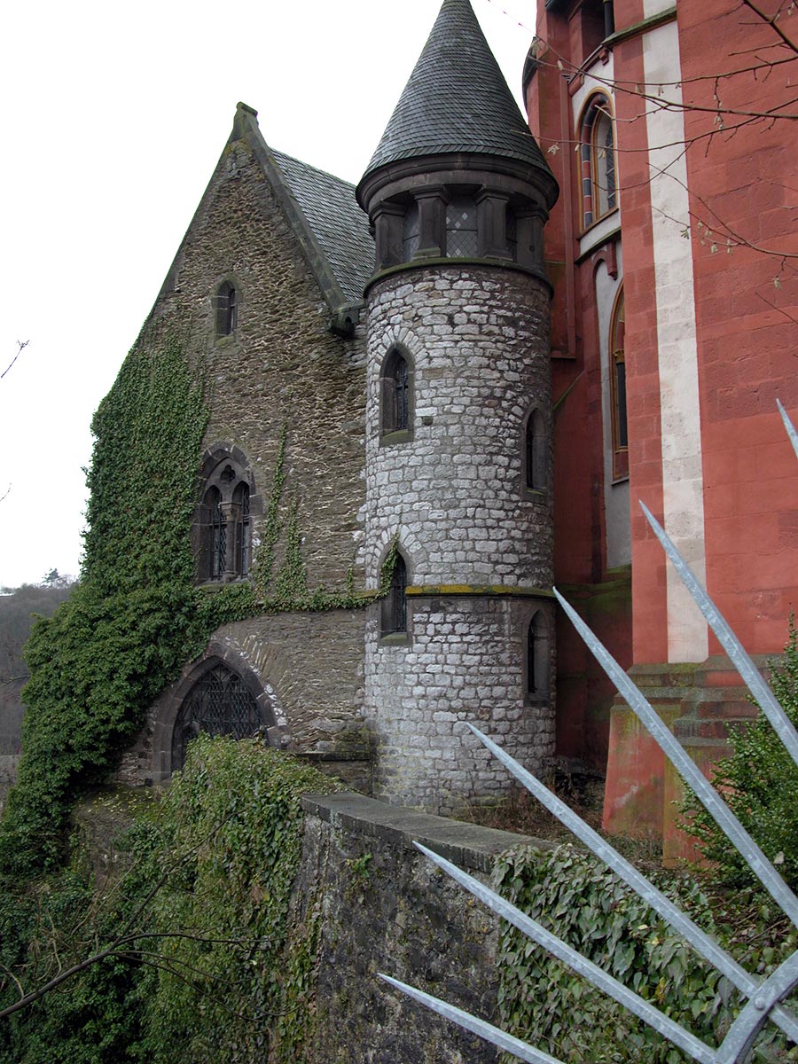 Stone tower and building behind Limburg Cathedral in Limburg an der Lahn, Germany