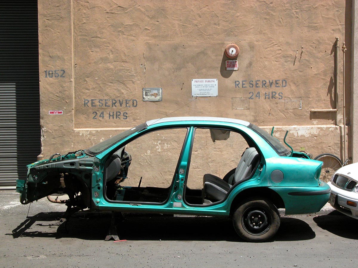 Stripped car body parked in Honolulu, Hawaii