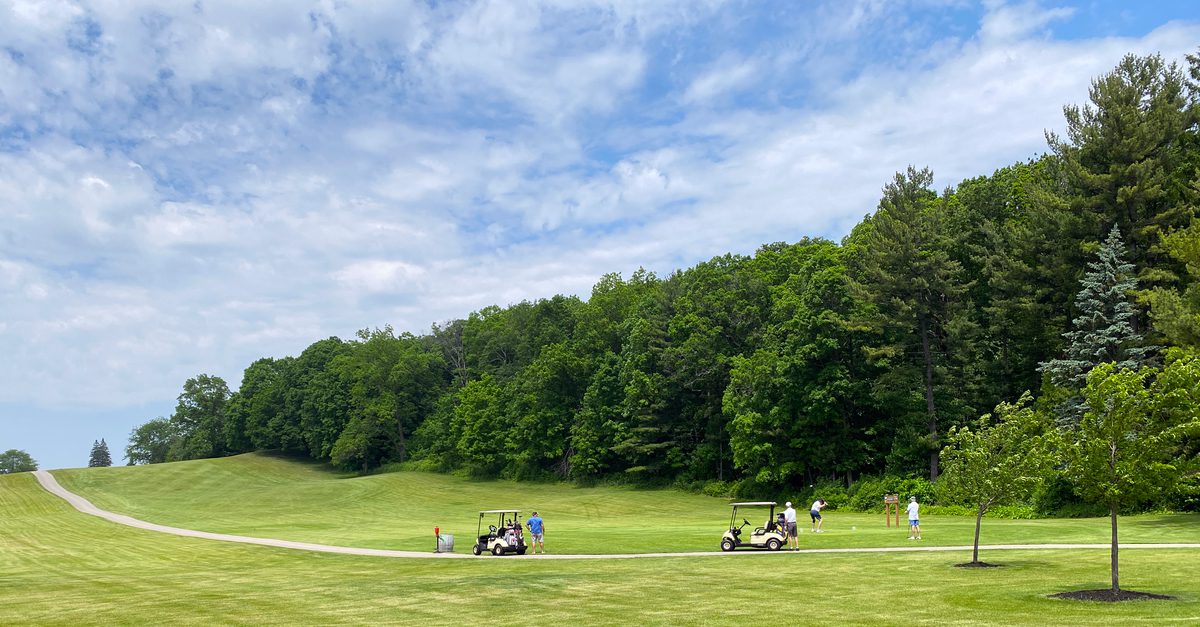 Golfers playing the 17th hole of Petrifying Springs Golf Course in Kenosha, Wisconsin.